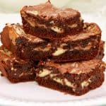 Keto cheesecake swirled brownies to curb your chocolate and cheesecake cravings.