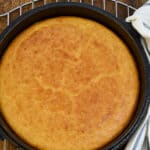 keto coconut flour cornbread in a cast iron skillet on top of baking rack