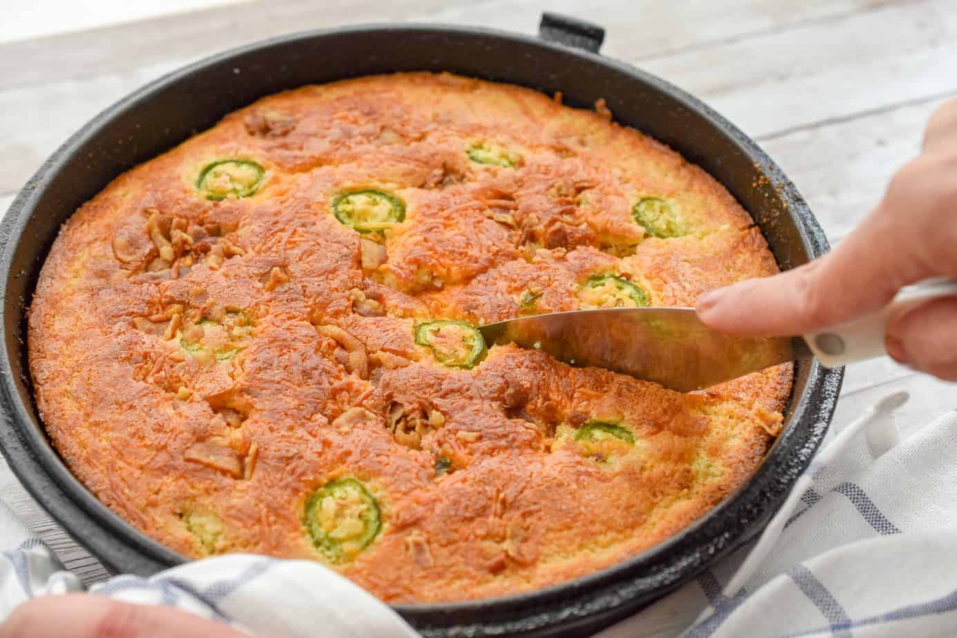 This delicious keto jalapeño cheddar bacon cornbread will fool your tastebuds into thinking it's the real thing. Yet it uses zero corn or cornmeal and even the texture is spot on.  Don't miss out cornbread will doing keto and grab the recipe!