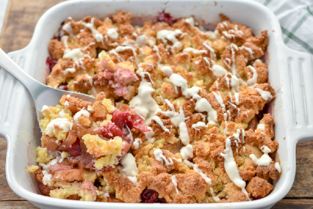 keto apple cranberry cobbler in a white baking dish