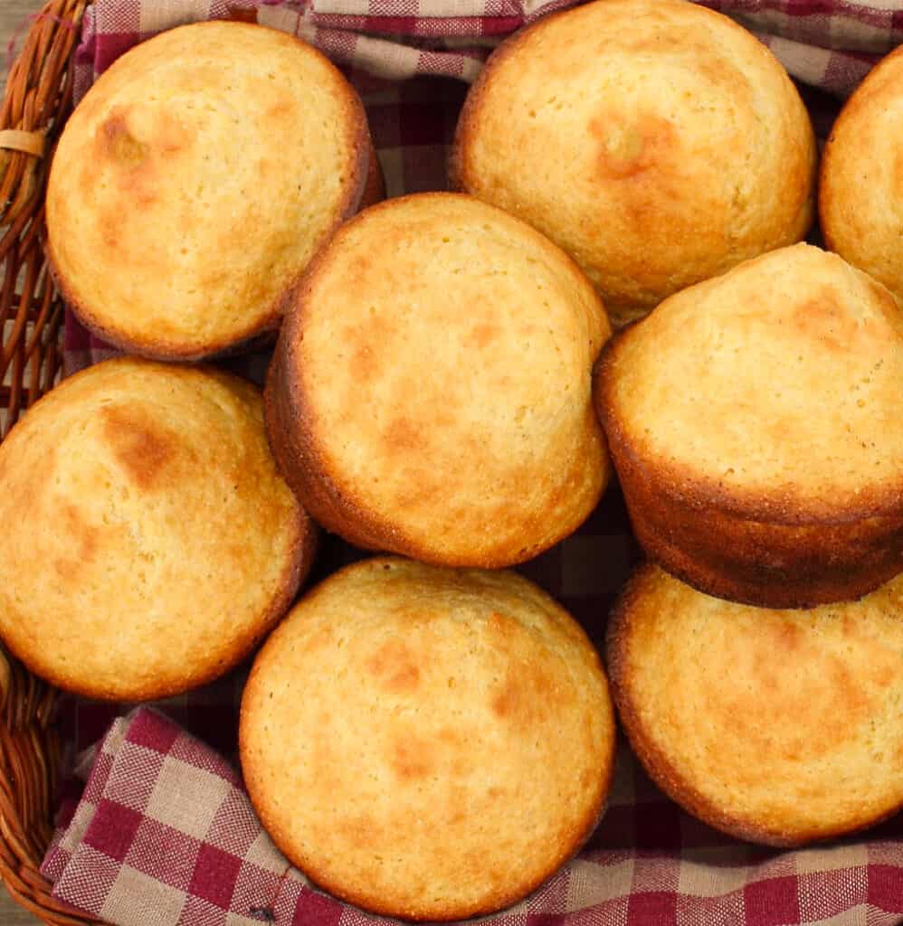 almond flour cornbread muffins in basket with red and white checked napkin