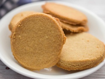 coconut flour shortbread cookies on a white plate