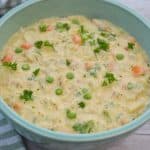 Keto chicken or turkey pot pie filling in a large aqua bowl