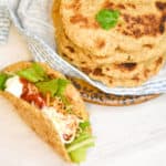 keto tortilla taco with stack of tortillas in background