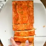 keto kielbasa cornbread loaf being sliced