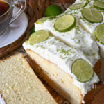 keto key lime pound cake sliced on a wooden board