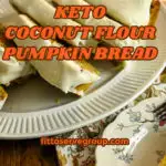 keto coconut flour pumpkin bread sliced on a white platter