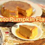 keto pumpkin flan sliced and ready to serve on a wooden board