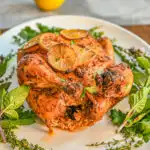 Low carb harissa sumac chicken served on a white platter