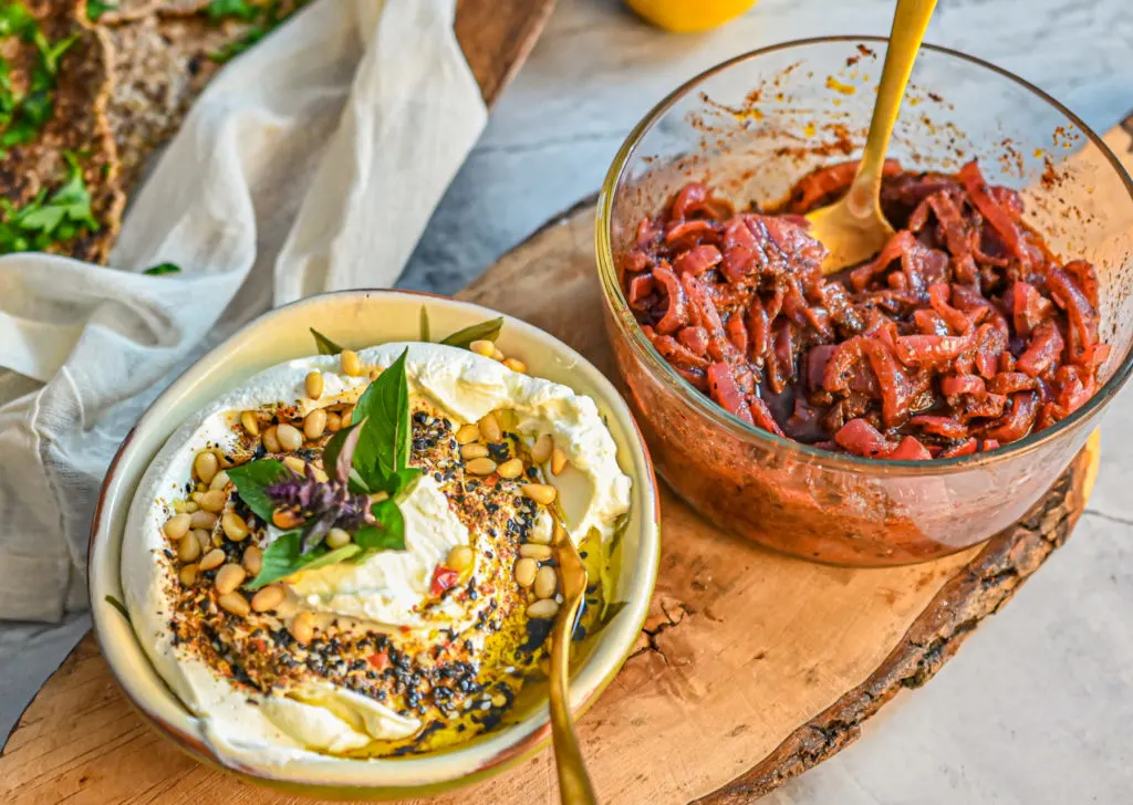 keto sumac onion spread and labneh cheese on a wooden board