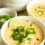 keto white chicken chili served in white bowls