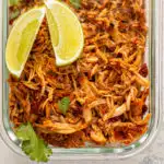 keto Mexican Chicken shredded in a clear pyrex