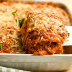 keto chicken lasagna baked in a white dish