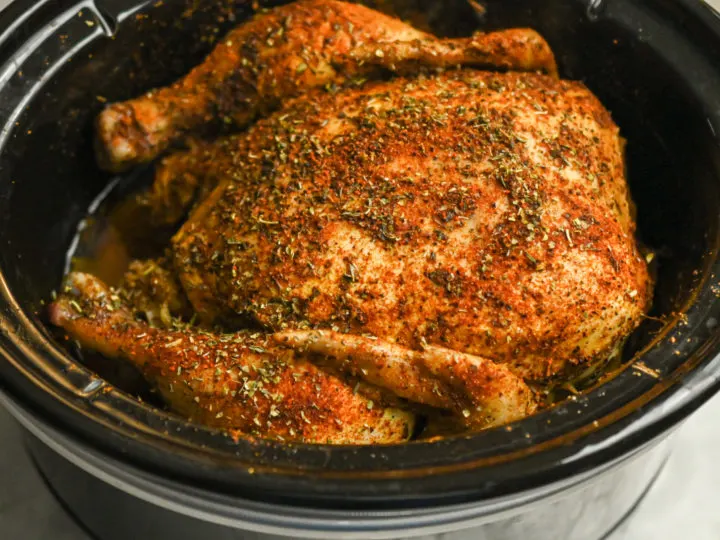 whole keto chicken cooked in a crockpot