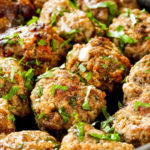 keto pastrami meatballs served in a black shallow bowl