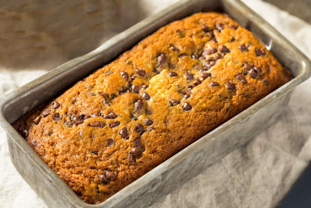 Low-carb chocolate chip banana bread baked in a metal pan